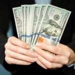 front view person holding money