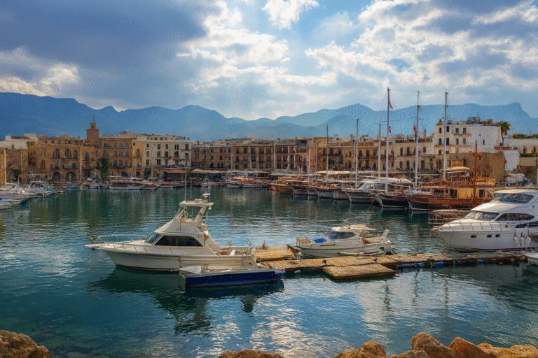 Superyachts docked at the exclusive Karpaz Gate Marina with crystal-clear waters, North Cyprus