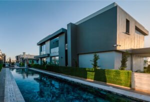Dashad Blog | Construction, Real Estate & Investment Insights in North Cyprus Modern luxury villa in Northern Cyprus showing a 7% rental yield, illustrating strong rental income potential for investors.